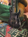 2012 Schecter Omen Extreme-FR Electric Guitar in See Thru Black