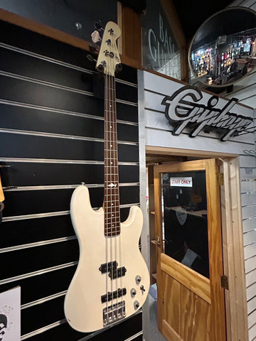 Marlin Sidewinder 4 String Bass Guitar, working electrics, playable condition, action not adjustable.